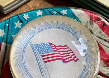 American flag glass decoupage dome on a table