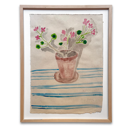 A framed watercolor painting of a terracotta pot with pink flowers and green leaves on a striped blue and beige background, enclosed in a light wood frame.