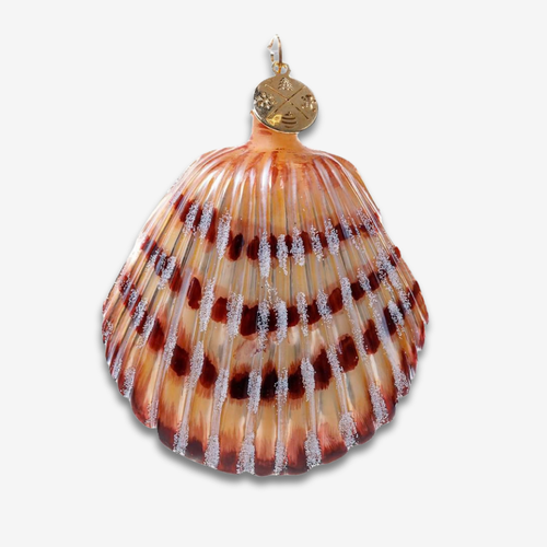 A decorative shell-shaped ornament resembling a scallop shell, with a gold hanging loop at the top, featuring amber, orange, and dark brown bands with silver crystalline accents, shown on a light gray background.