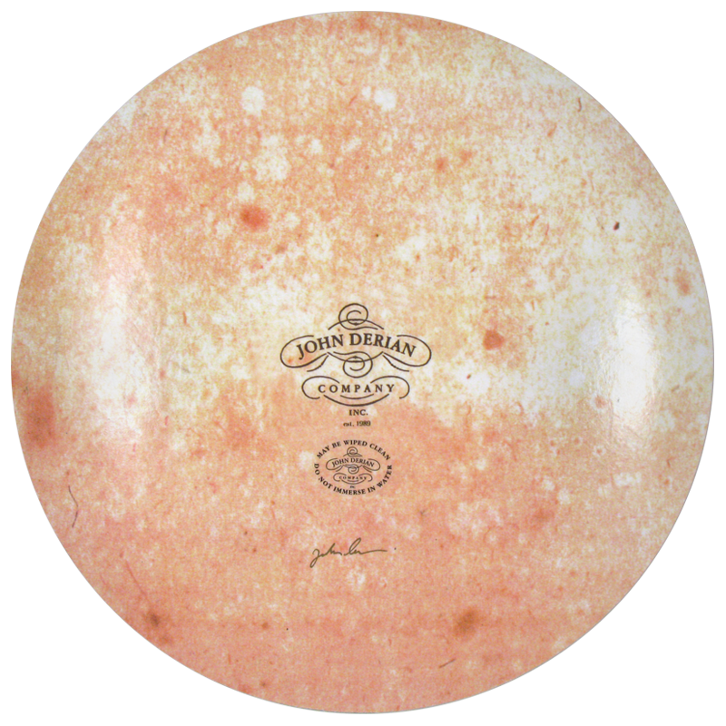 The back of an 13-inch round plate  featuring the signature John Derian Company sticker and signed by John Derian. 