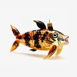 A hand-painted glass koi fish ornament with a gold and black mottled body, orange fins, and a small gold hanging loop on a white background.