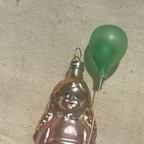 Nostalgic Girl Holding Balloon Ornament