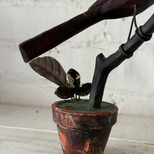 Black Forest Carved Perched Bird on Clay Pot (#1)