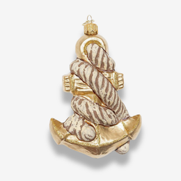 A Christmas ornament shaped like a rope anchor, featuring a textured beige and brown rope wrapped around a metallic gold anchor base, shown on a light gray background.
