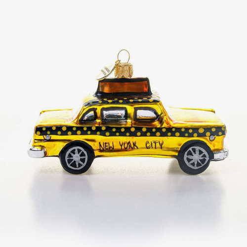 A glass hand-painted ornament shaped like a New York City retro taxi won a white background