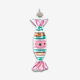 A candy-shaped hanging ornament with pink tails, turquoise and white horizontal stripes, a pink center band, and a small silver hanging loop at the top, shown on a light gray background.