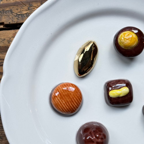 Trompe L'oeil Chocolates Plate with Waved Rim