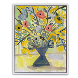 A framed painting of a floral bouquet in a vase, featuring yellow flowers, pink blossoms, and blue-gray leaves and stems against a pale yellow and green background.