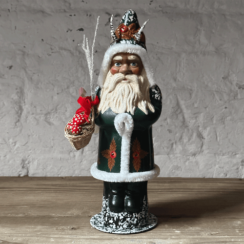 Santa Krampus in green Coat with Basket