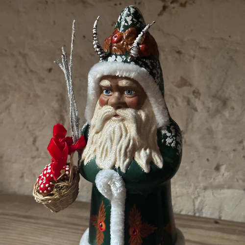 Santa Krampus in green Coat with Basket
