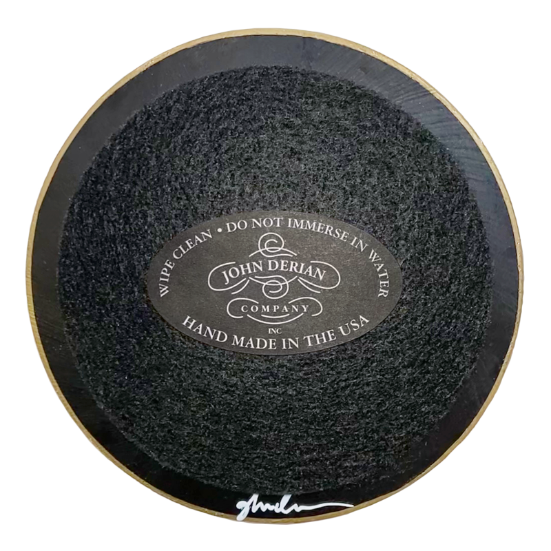 Back of four inch round plate with black paint, black felt and gold trim. 