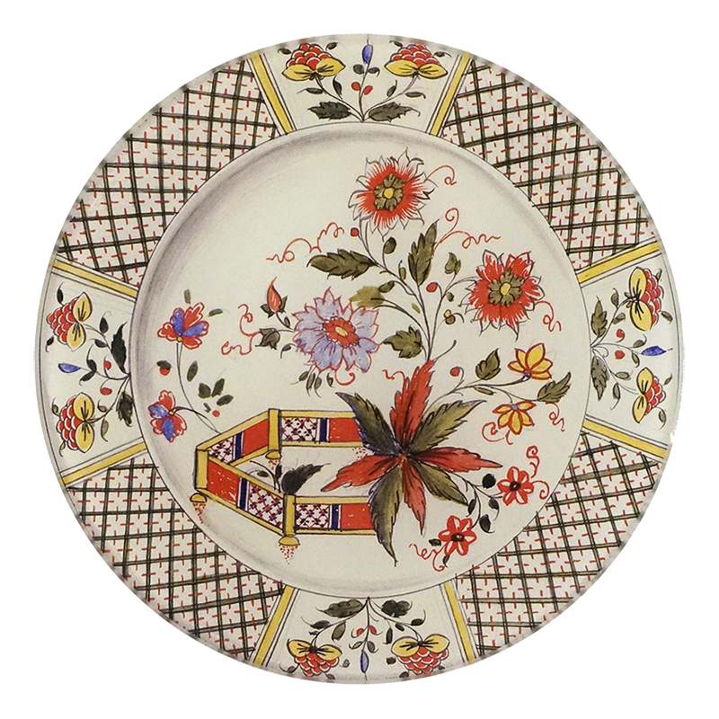 A five inch round glass plate featuring an intricate design compiled of flowers and patterns