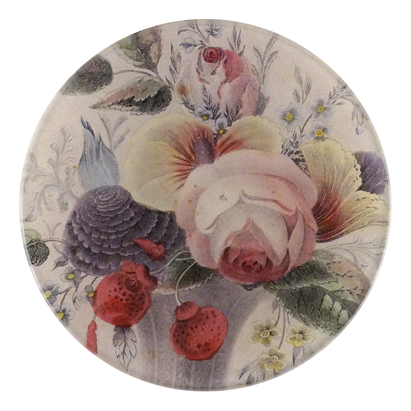 A five inch round glass plate featuring a handblown glass design with a floral pattern, including roses and other flowers in a multicolored palette.