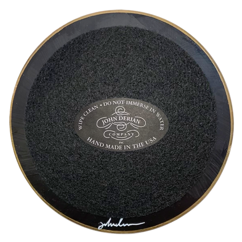 Back of 5 inch round plate with black paint, black felt and a gold trim. Featuring John Derian Company sticker and signature 