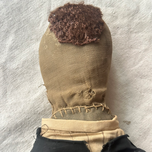19th-century Male Doll with Embroidered Face
