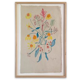 A framed botanical art print featuring a hand-drawn bouquet of yellow, orange, red, and blue flowers on a textured beige paper background, enclosed in a light natural wood frame with a white mat.