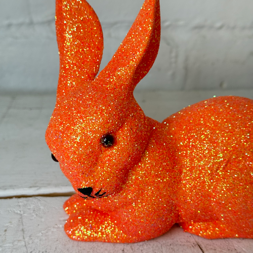 Ino Schaller Lying Glitter Bunny in Orange with Tail