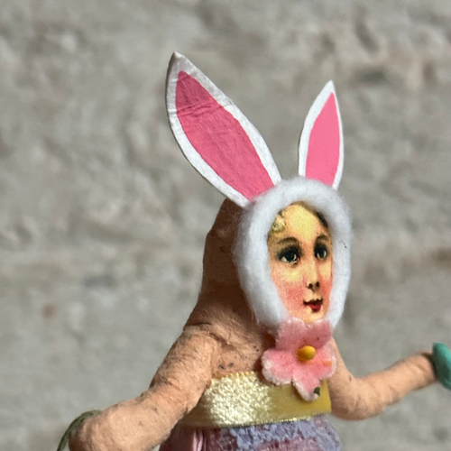 Girl with Rabbit Ears and Easter Basket