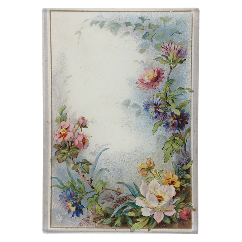 A floral design around the right boarder of a four and a half inch by six and a half inch glass tray. 