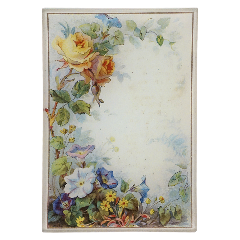 A floral design of tulips and roses on a four and a half inch by six and a half inch glass tray. 