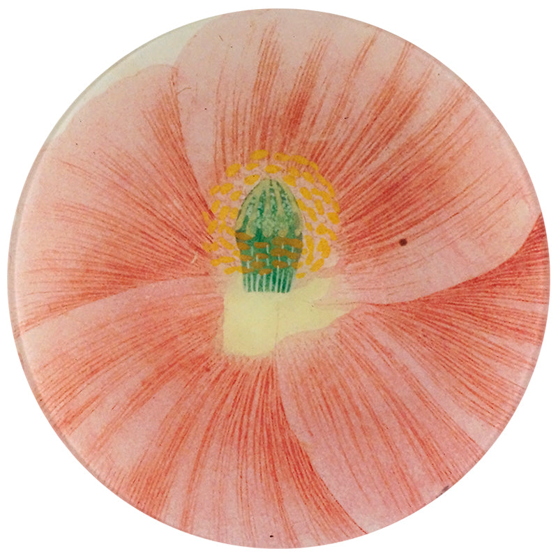 A ten inch round glass plate with a pink poppy design, featuring a green center and pink petals.