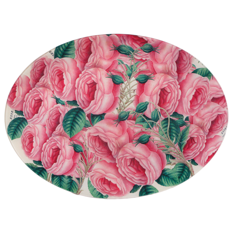 A fourteen inch by nineteen inch horizontal oval glass plate featuring an illustration of pink roses with green leaves. 
