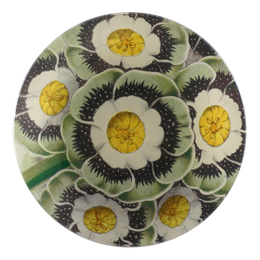A four inch round handmade decoupage plate titled Primrose