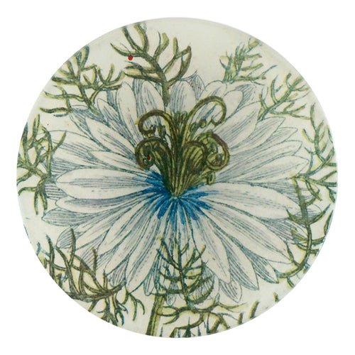 A four inch round handmade decoupage plate titled Nigella Pale