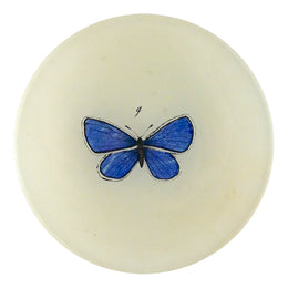 A four inch round handmade decoupage plate titled Petit Blue Butterfly