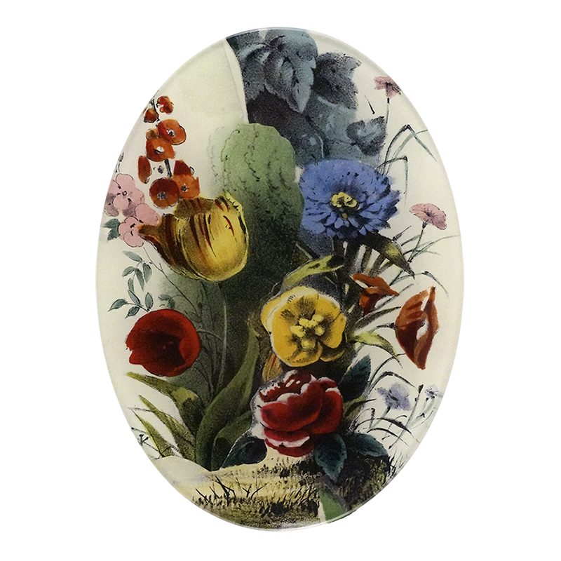 A 5 inch  x 7 inch vertical oval glass plate floral featuring a variety of colorful flowers .