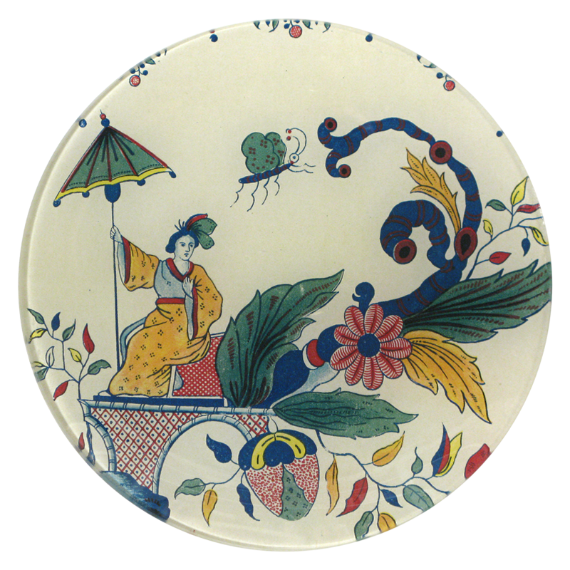 A seven inch round glass plate featuring a person in traditional attire under a umbrella, surrounded by floral and fantastical motifs.