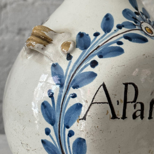 18th Century French Apothecary Jar with blue & White design on a table