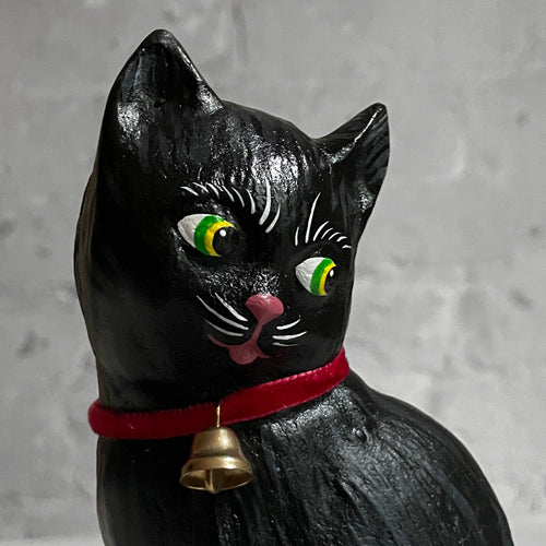Small Black Cat with Bell