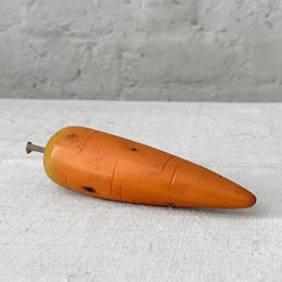 Carrera Marble Carrot sculpture on table