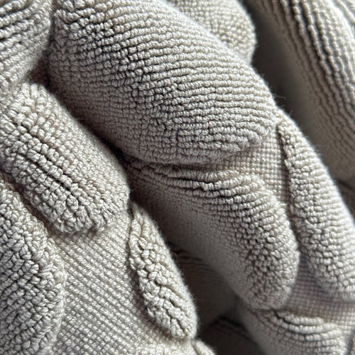 Textured grey bathmat detail