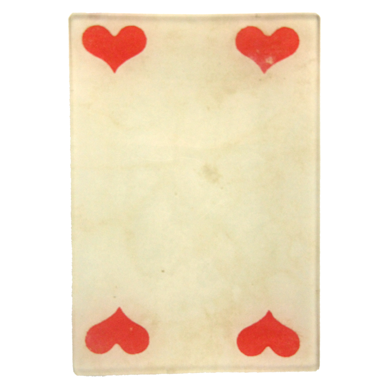 A playing card with a design of red hearts corners on a  four and a half inch by six and a half inch glass tray. 