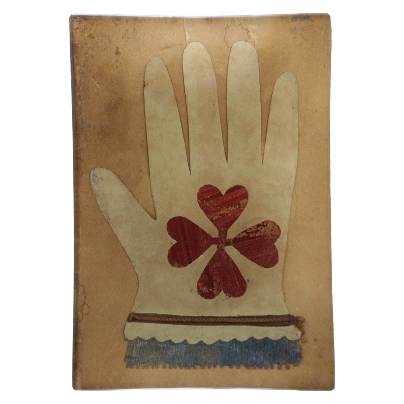 An illustration of a white glove with a red clover on a beige four and half inch by six inch glass tray. 