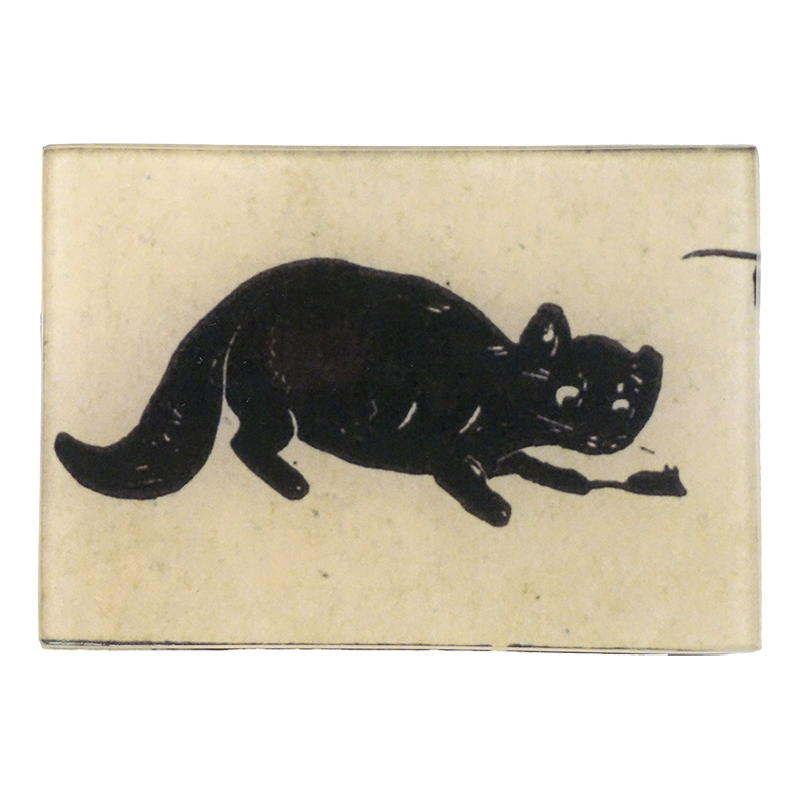 A black silhouette of a cat looking at a mouse with a beige background on a three and a half inch by five inch glass tray. 